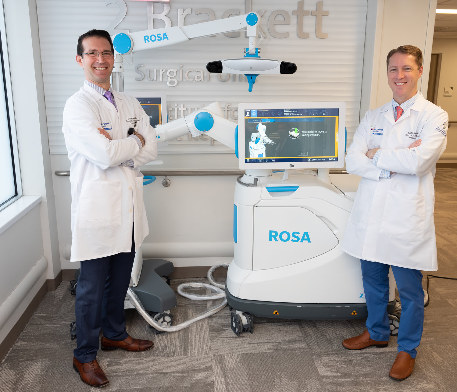 South Shore University Hospital chair of orthopaedic surgery Michael Nett and chief of joint reconstruction Keith Reinhardt with the ROSA Knee System at the Bay Shore hospital.